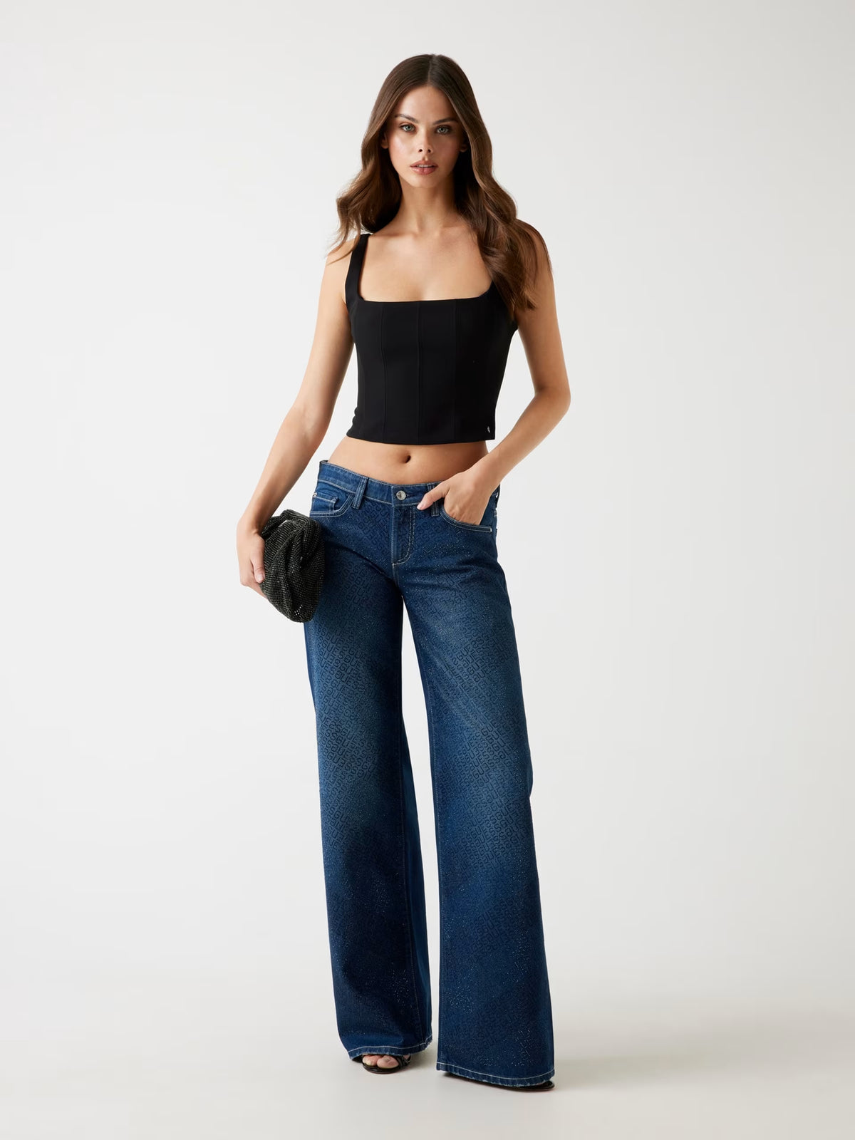 Vaqueros regulares con logotipo en toda la prenda